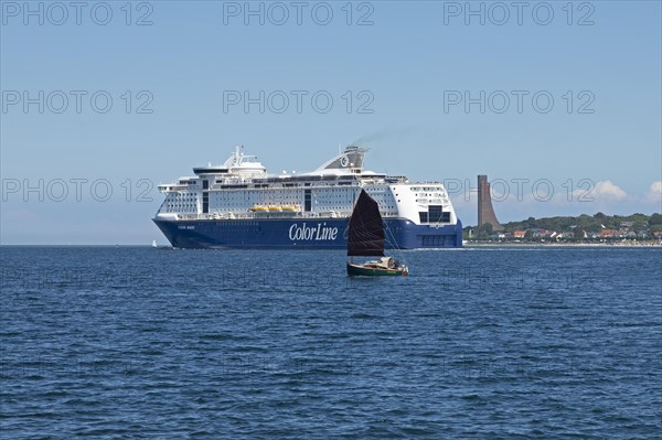 Sailboat and Color Line Cruises cruise ship off Laboe