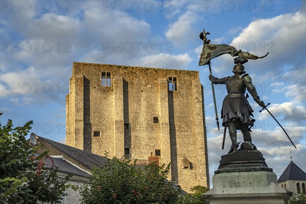 Statue of Joan of Arc and the Donjon fortress in Beaugency