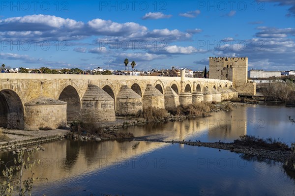 Roman bridge over the river Rio Guadalquivir in Cordoba