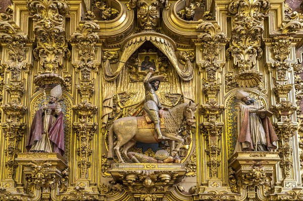 Wood carving in a side chapel of the Cathedral of Santa Maria de la Encarnacion in Granada