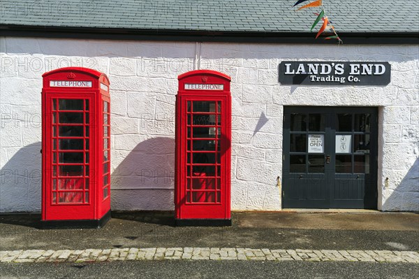 Two red telephone boxes