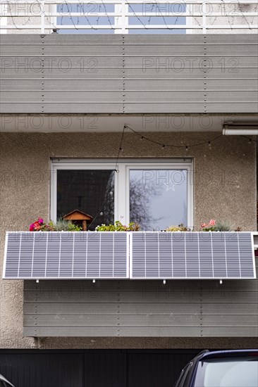 Balcony power plant made of solar panels on a house in Duesseldorf