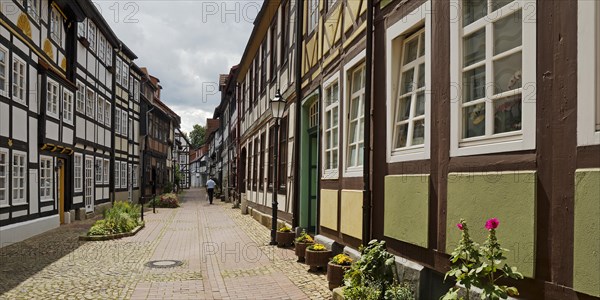 Narrow alley with historic half-timbered houses in the old town