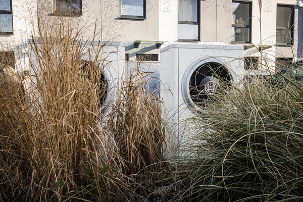 Air source heat pump in front of a terraced house in Duesseldorf