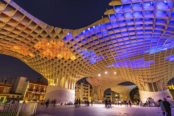 The futuristic wooden construction and observation deck Metropol Parasol at the Plaza de la Encarnacion at dusk