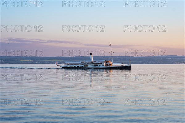 Steamboat in the evening light on Lake Constance near Meersburg