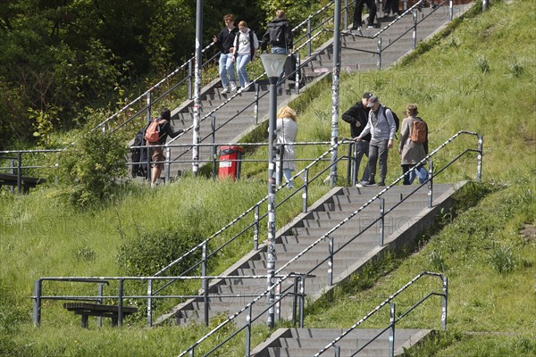 Stairs with pedestrians on a slope