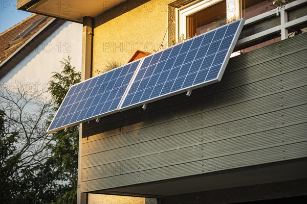 Balcony power plant made of solar panels on a house in Duesseldorf