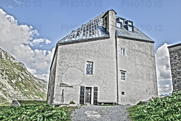 Photo with reduced dynamic range saturation HDR of view on historic hotel accommodation Ospizio San Gottardo Sankt Gotthard Hospiz with historic buildings from year 1237 13th century on 2091 meter high Gotthardpass