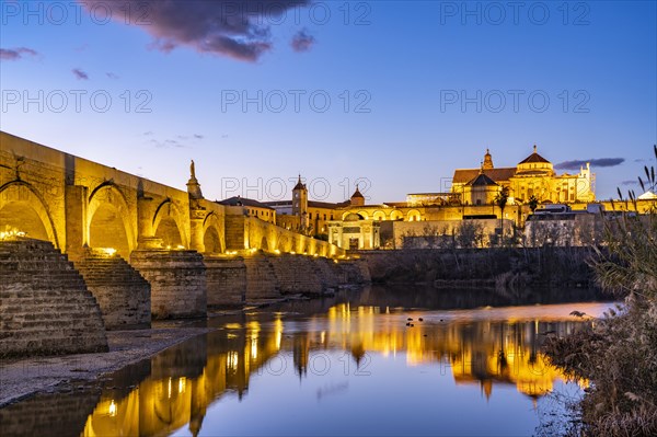 Roman bridge over the river Rio Guadalquivir and the Mezquita