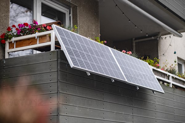 Balcony power plant made of solar panels on a house in Duesseldorf