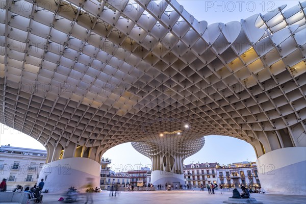 The futuristic wooden construction and observation deck Metropol Parasol at the Plaza de la Encarnacion at dusk