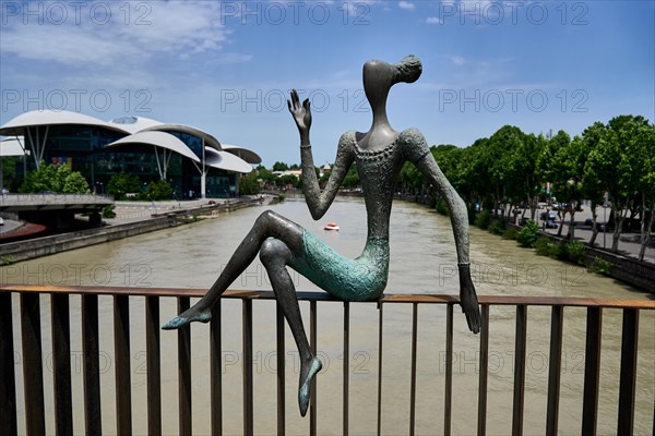 Bronze figure on the Baratashvili Bridge