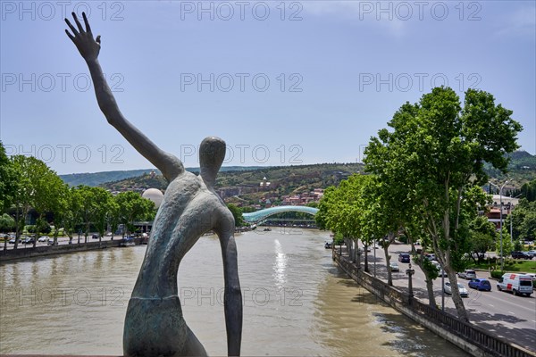 Bronze figure on the Baratashvili Bridge