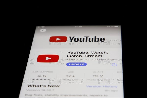 Detailed view of a smartphone with Youtube app in the iPhone App Store