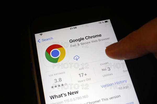 Detailed view of a smartphone with Google Chrome App in the iPhone App Store
