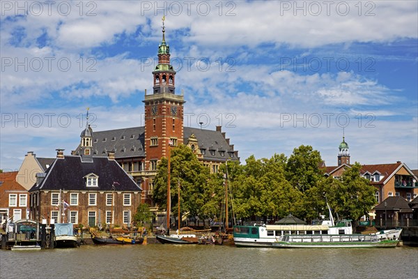 Museum harbour with old scales and town hall