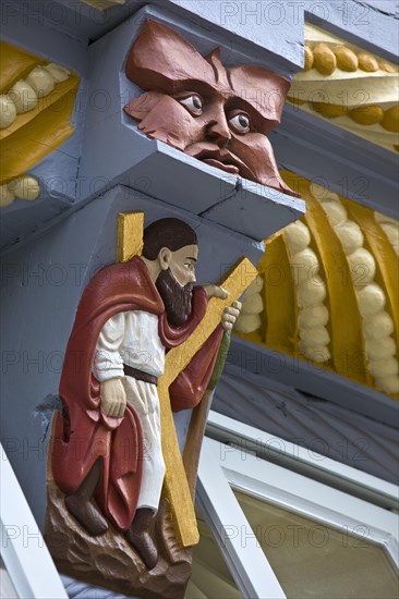 Wood carving on the facade