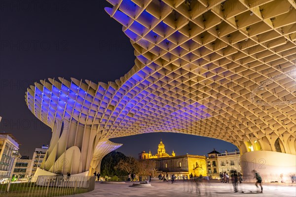 The futuristic wooden construction and observation deck Metropol Parasol at the Plaza de la Encarnacion at dusk