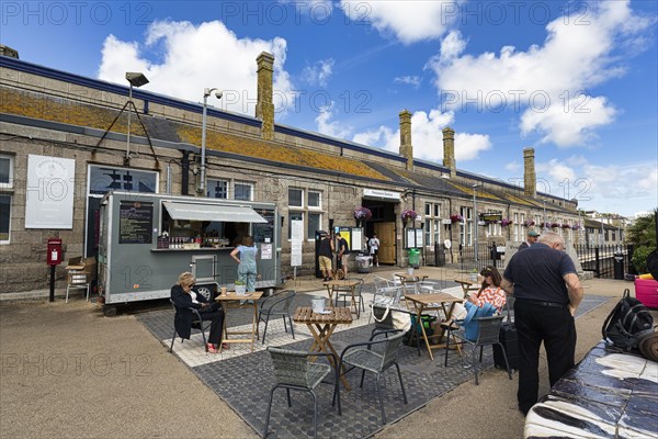 Railway station with street cafe in Penzance