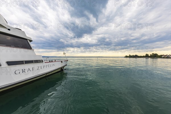 Lake Constance in the evening with the excursion boat Graf Zeppelin