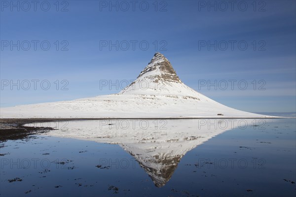 Kirkjufell mountain on the Snaefellsnes peninsula in the snow in winter