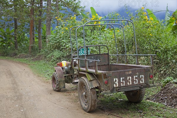Typical Chinese two-wheel tractor with trailer in the Yunnan province
