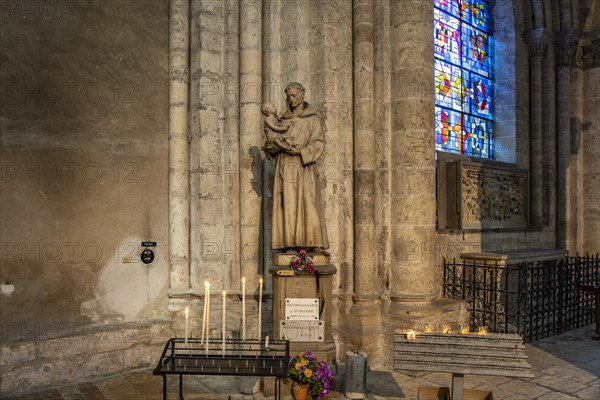 Statue of St Antoine in the interior of Saint-Nicolas Church