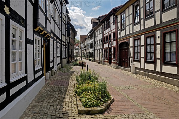 Narrow alley with historic half-timbered houses in the old town