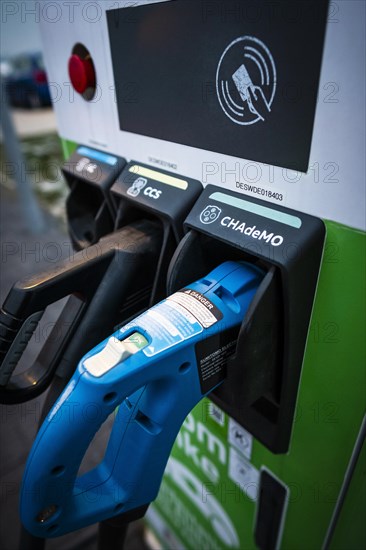 Different plugs of a public charging station for e-cars of the Stadtwerke Duesseldorf