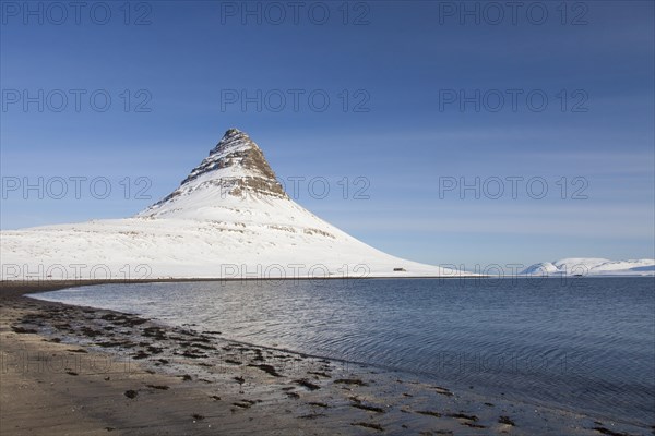 Kirkjufell mountain on the Snaefellsnes peninsula in the snow in winter