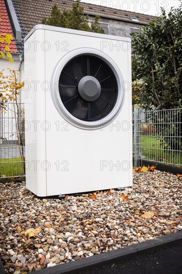 Air source heat pump in front of an apartment building in Hilden