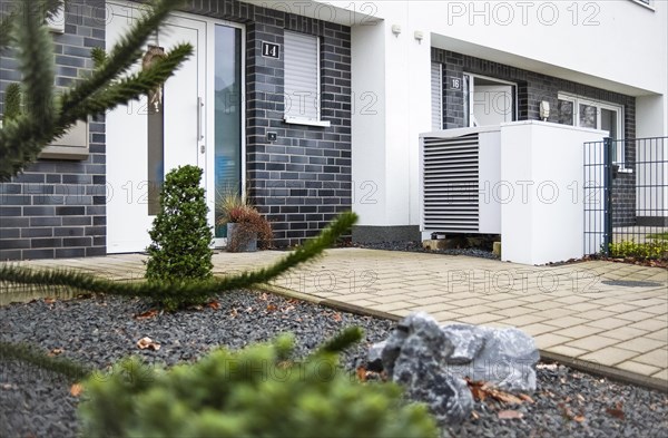 Heat pump in the front garden of a terraced house in Langenfeld