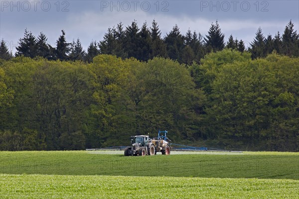 Farmer spraying pesticides