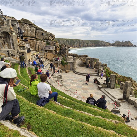 Grass-covered audience seats at The Minack Theatre