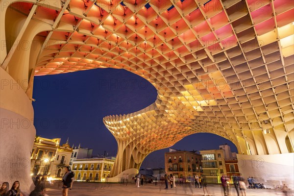 The futuristic wooden construction and observation deck Metropol Parasol at the Plaza de la Encarnacion at dusk