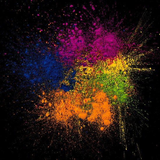 Close up bright rangoli colors spread background
