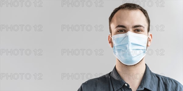 Portrait businessman with mask
