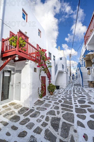 Cycladic white houses with colourful doors and shutters