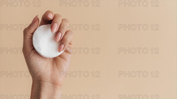 Healthy beautiful manicure with cotton pads copy space