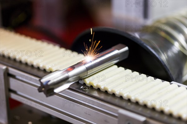 Marking a tap with a laser