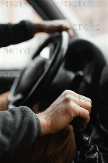 Close up man car driving