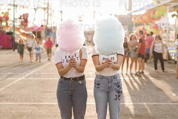 Happy friends having fun amusement park