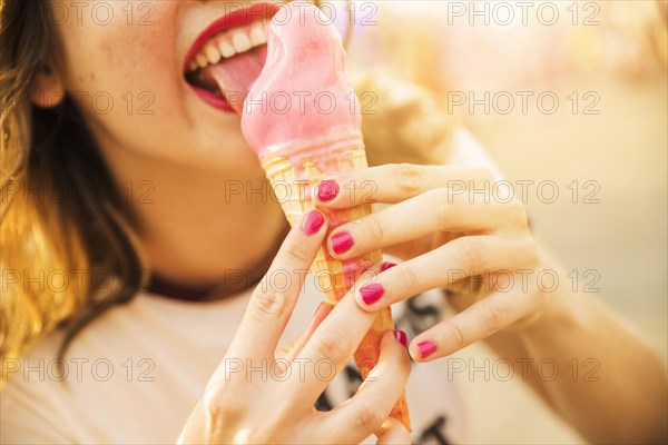 Close up woman eating ice cream