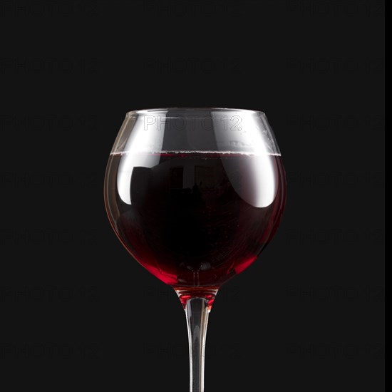 Elegant dark red wine glass