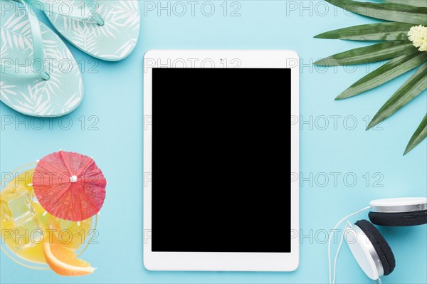 Tablet summer things colored background
