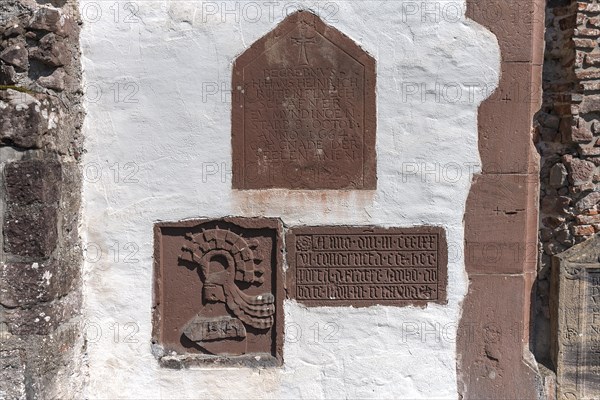 Grave plaques and coats of arms at the former abbey of the Cistercian monks
