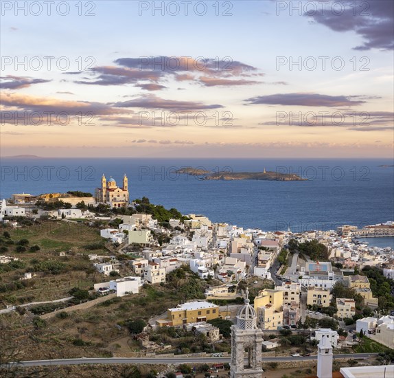 View of the town of Ermoupoli with Anastasi Church or Church of the Resurrection at sunset