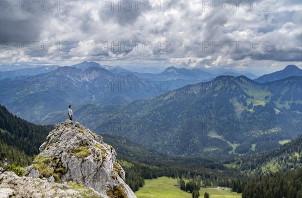 Mountaineer at the summit of Taubenstein