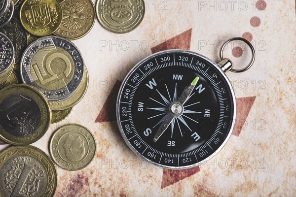 Close up coins compass